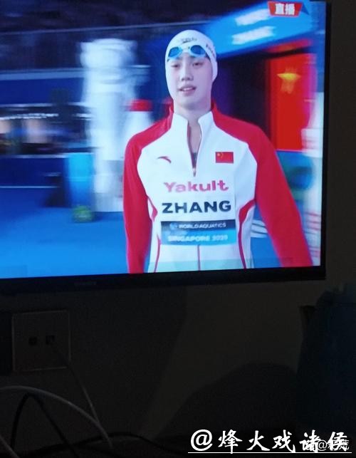 游泳世锦赛：覃海洋男子100米蛙泳夺金创历史 张雨霏摘得世锦赛个人首金